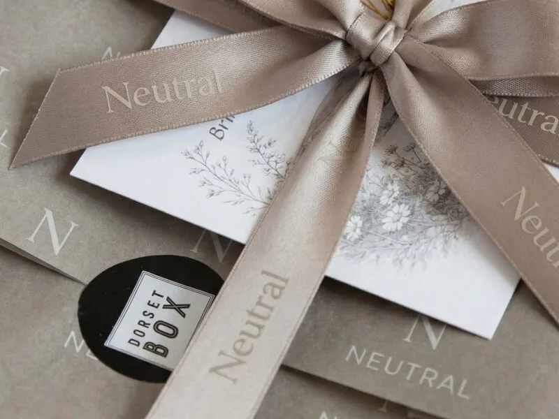 block-dorset-box-corporate-giting-two Dorset Box wrapped with branded ribbon and tissue paper